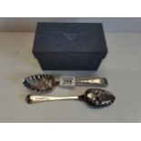 A pair of highly decorated fruit spoons in box 140g