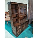 Dark Ercol sideboard with display cabinet and shelves above