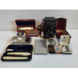 various Lighters, cut throat razor, x3 Harmonicas and a box camera