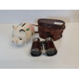 A Pair of Binoculars and a vintage 1950s piggy bank