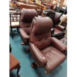 Pair of brown leather stressless style swivel chairs