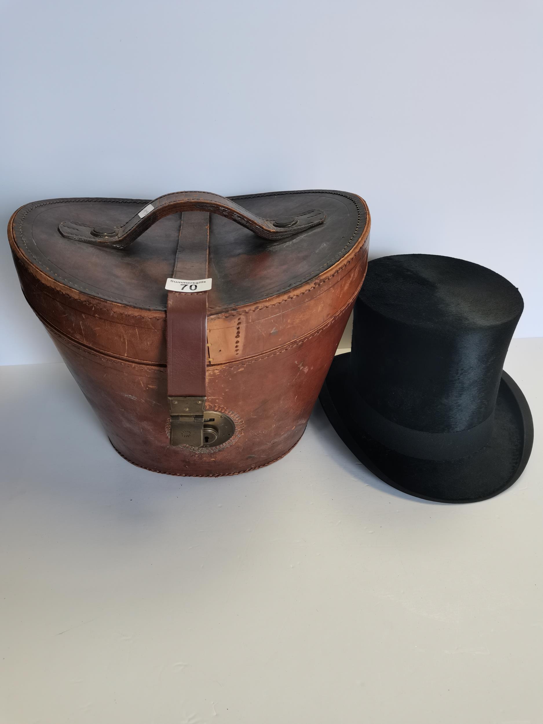 Top Hat by Lincoln Bennett & co in original leather box. Circumference of inside of headband 22.5