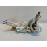 Nao figure - 'Lying girl with dog' good conditionCondition StatusCondition Grade:  A Excellent: In