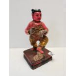 Oriental wooden figure