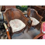 A beautiful pair of mahogany and bergère arm chairs