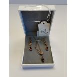 9ct Gold garnet bar drop earrings 2.6grams and pct Gold pendant and chain with garnet. 3.8grams