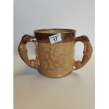 A stoneware Doulton style 3 handled hunting jug 18cm high ( slight chips )Condition