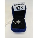 Ring in flower design cluster ring set with black and blue diamonds (one stone missing) size P
