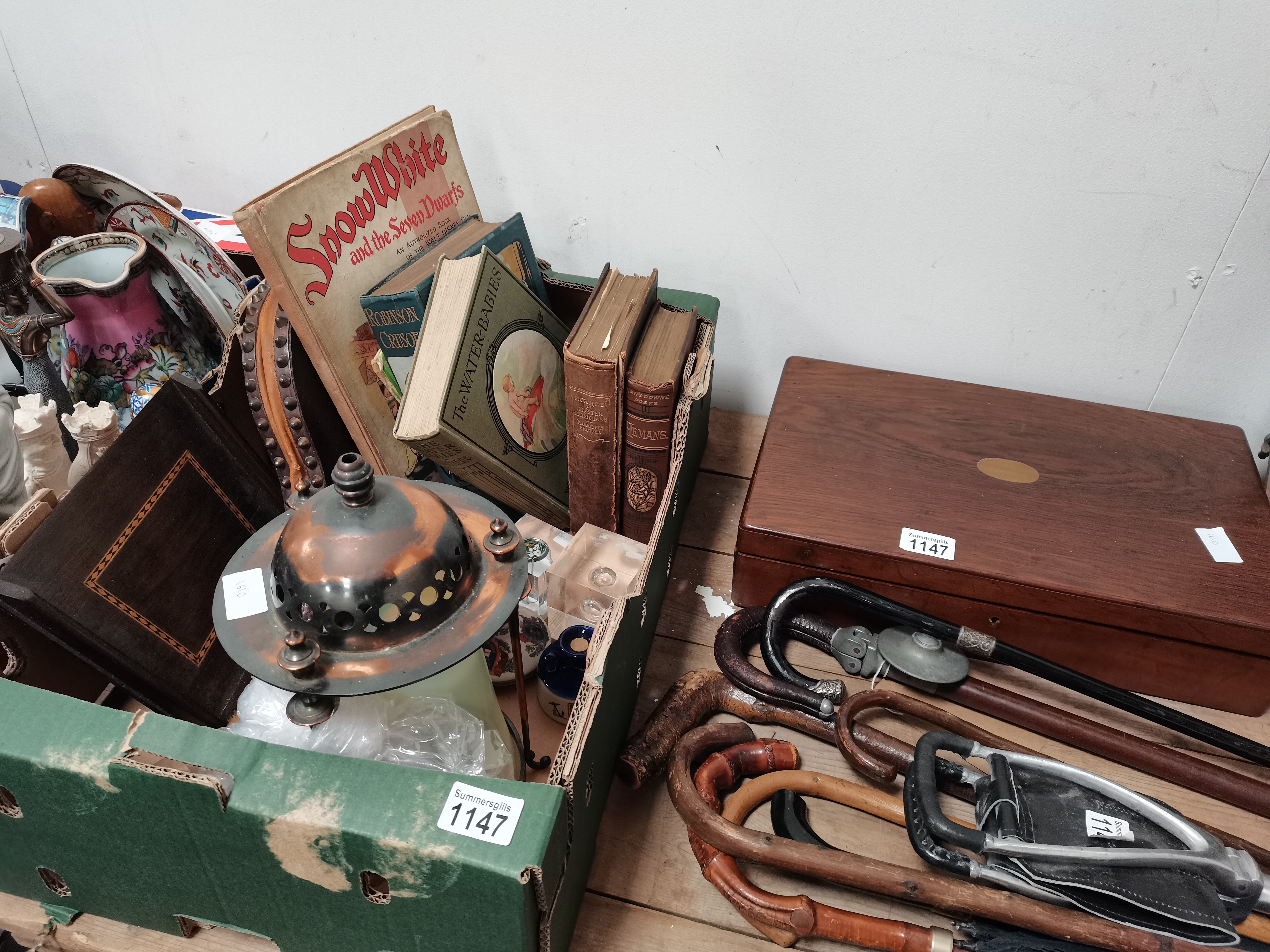 Box of misc items incl old books incl Robinson Crusoe 1924 edition, cutlery etc
