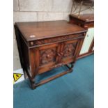 Carved dark oak drinks cabinet W76cm x D48cmCondition StatusCondition Grade:  B Good: In good