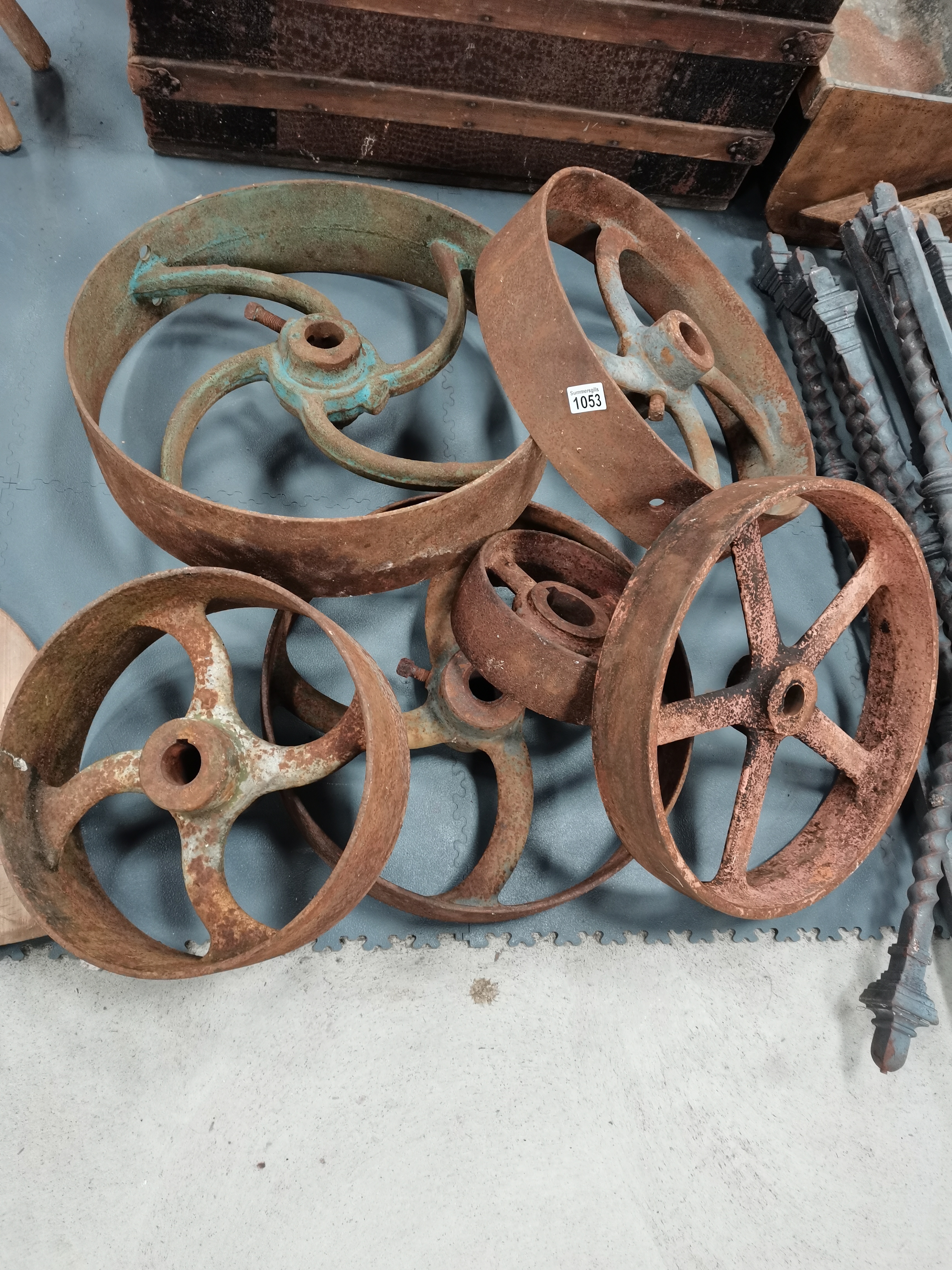 a collection of 6 iron wheels