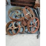 a collection of 6 iron wheels