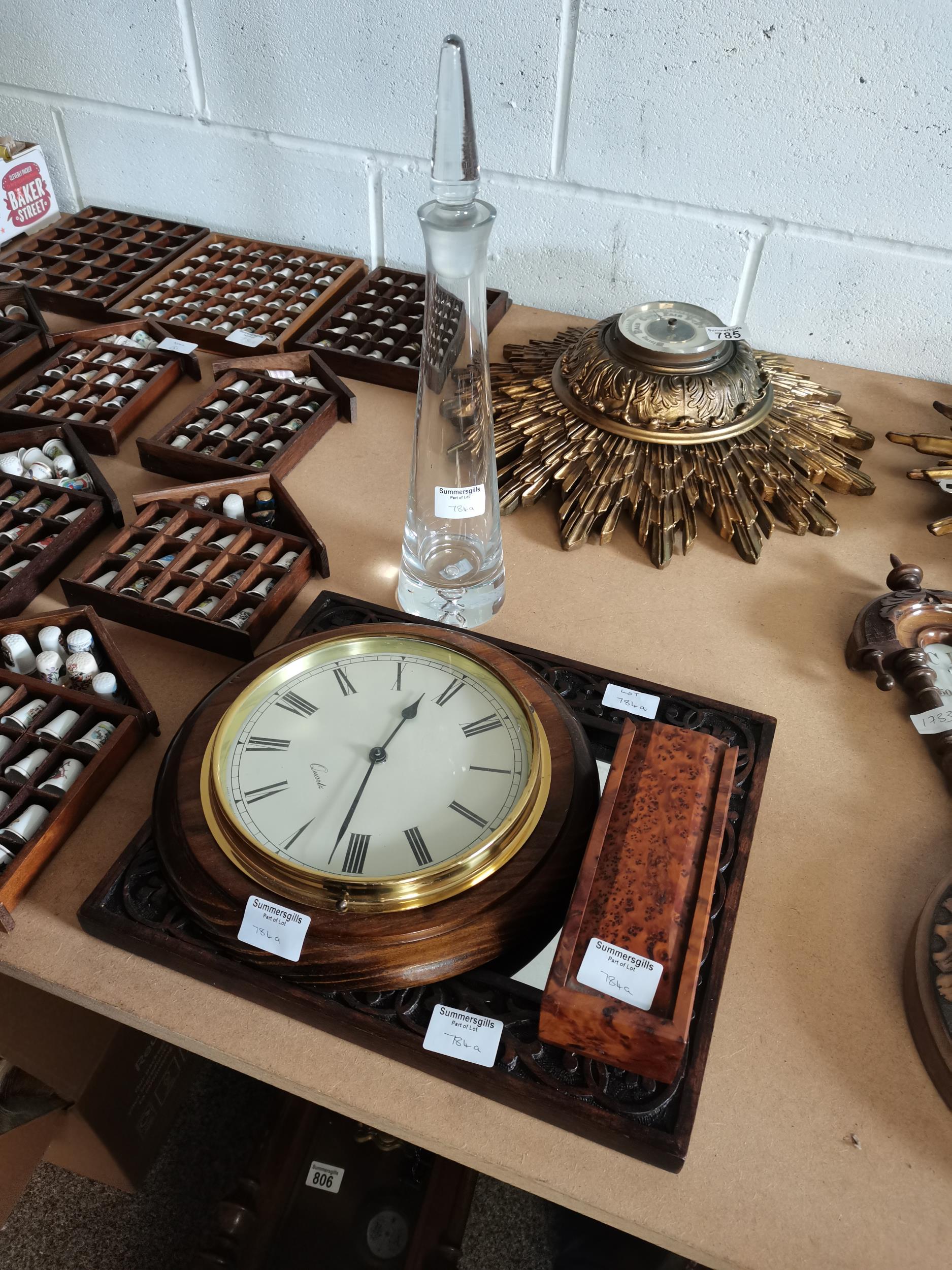 Wooden carved mirror, Walnut type dominoes, Circular wall clock and glass decanter