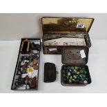A collection of old marbles, lead figures etc