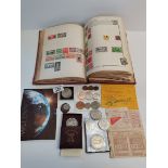 Wander Stamp Album and a collection of old coins