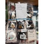 A selection of racing badges including Churchill Downs and Kentucky Derby