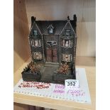 A Victorian dolls house valued by Fergus Ward on A