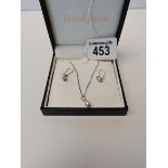 18ct White gold cultured freshwater pearl in cage earrings 1.5grams and 18ct white gold pendant