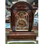 A large Edwardian bracket clock - chiming on eight and four gongs. In inlaid Rosewood case with