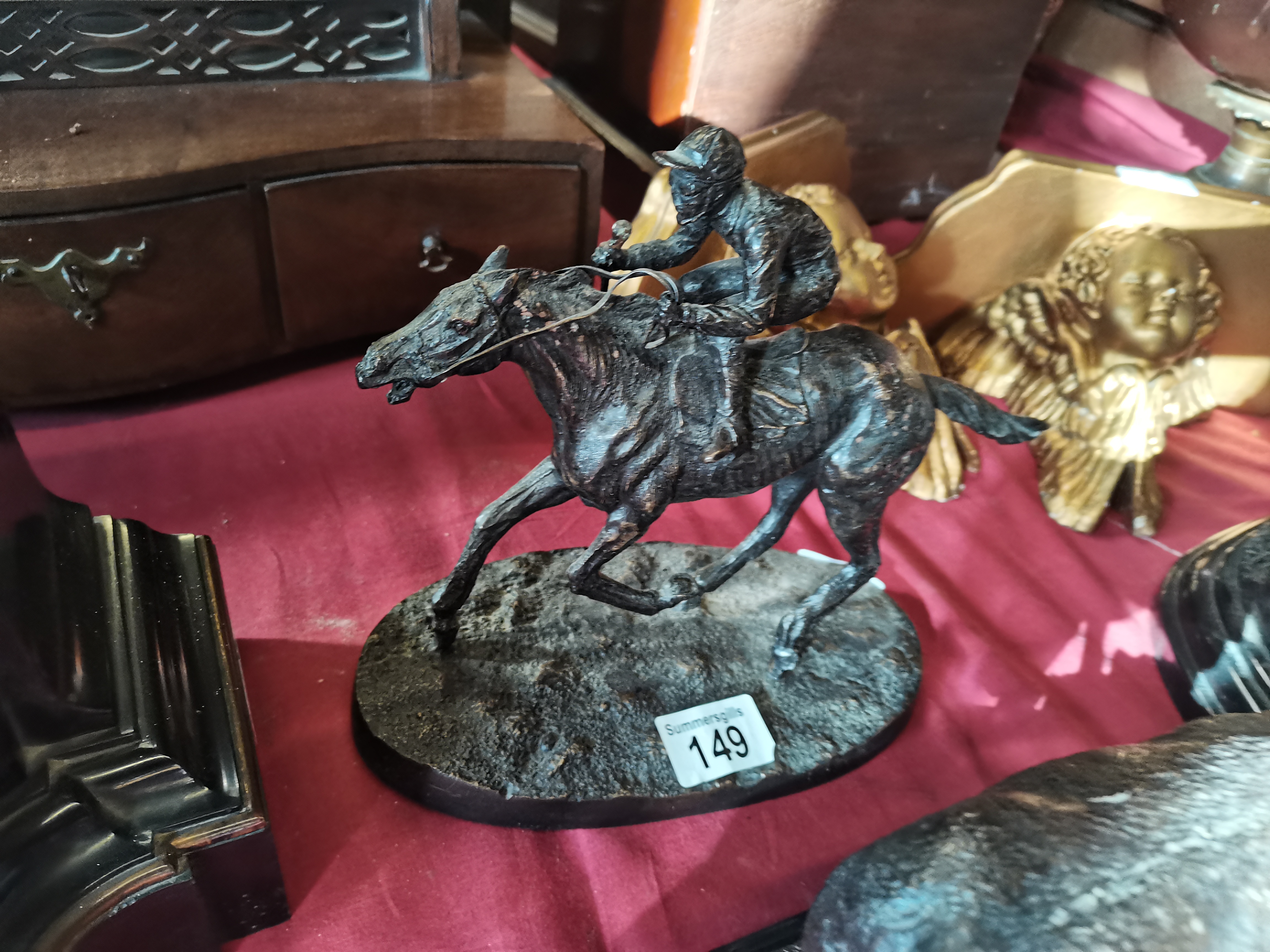 Bronze figure of Racehorse and Jockey on bronze ba