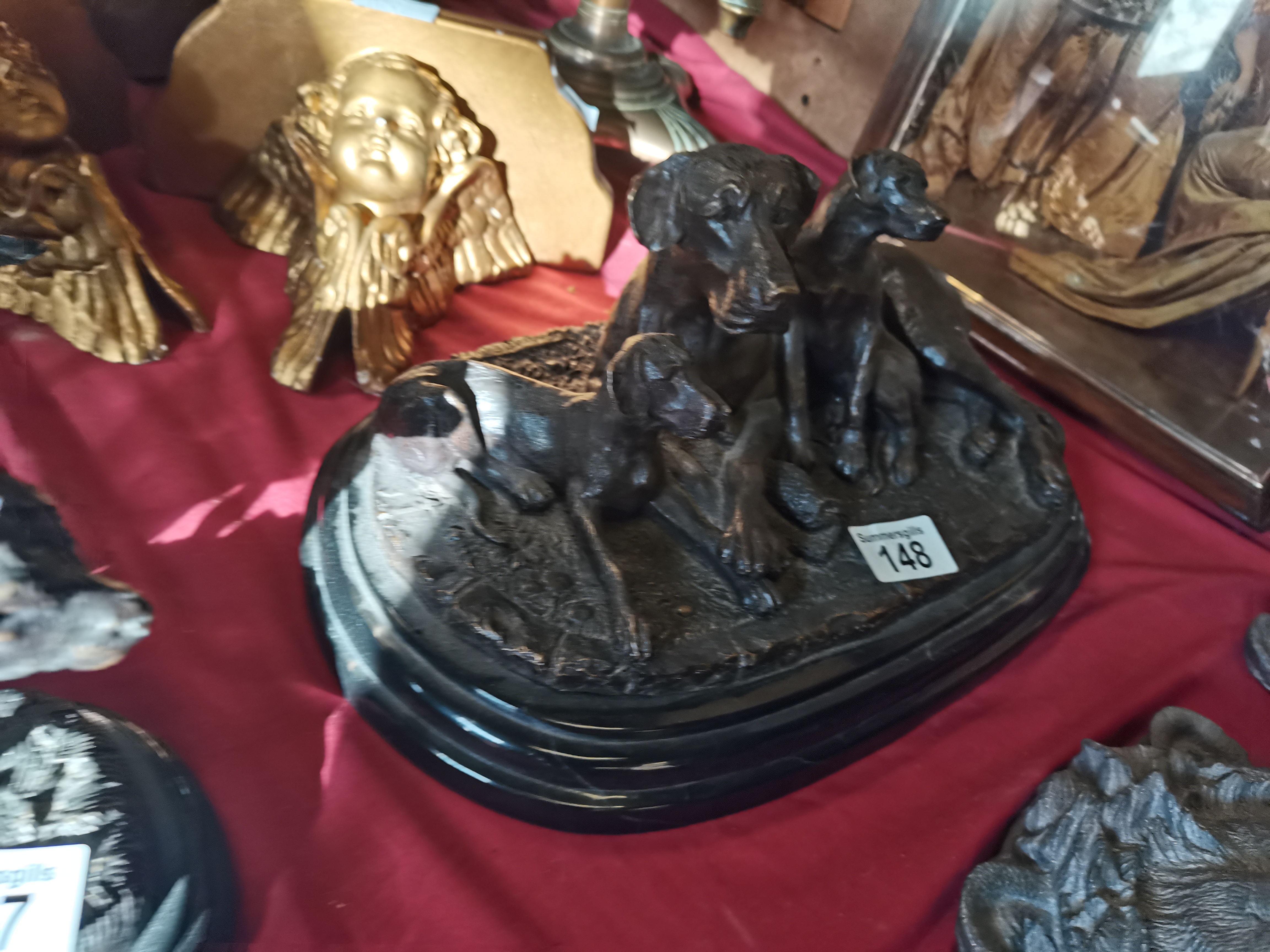 Bronze of Great Dane mum of 2 puppies on marble ba