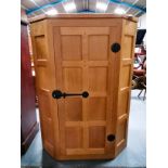 Mouseman wall mounted corner cupboard. very good c