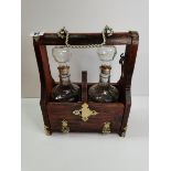 Tantalus with 2 cut glass decanters - key included