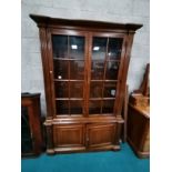 Large mahogany display cabinet with cupboard and glazed top