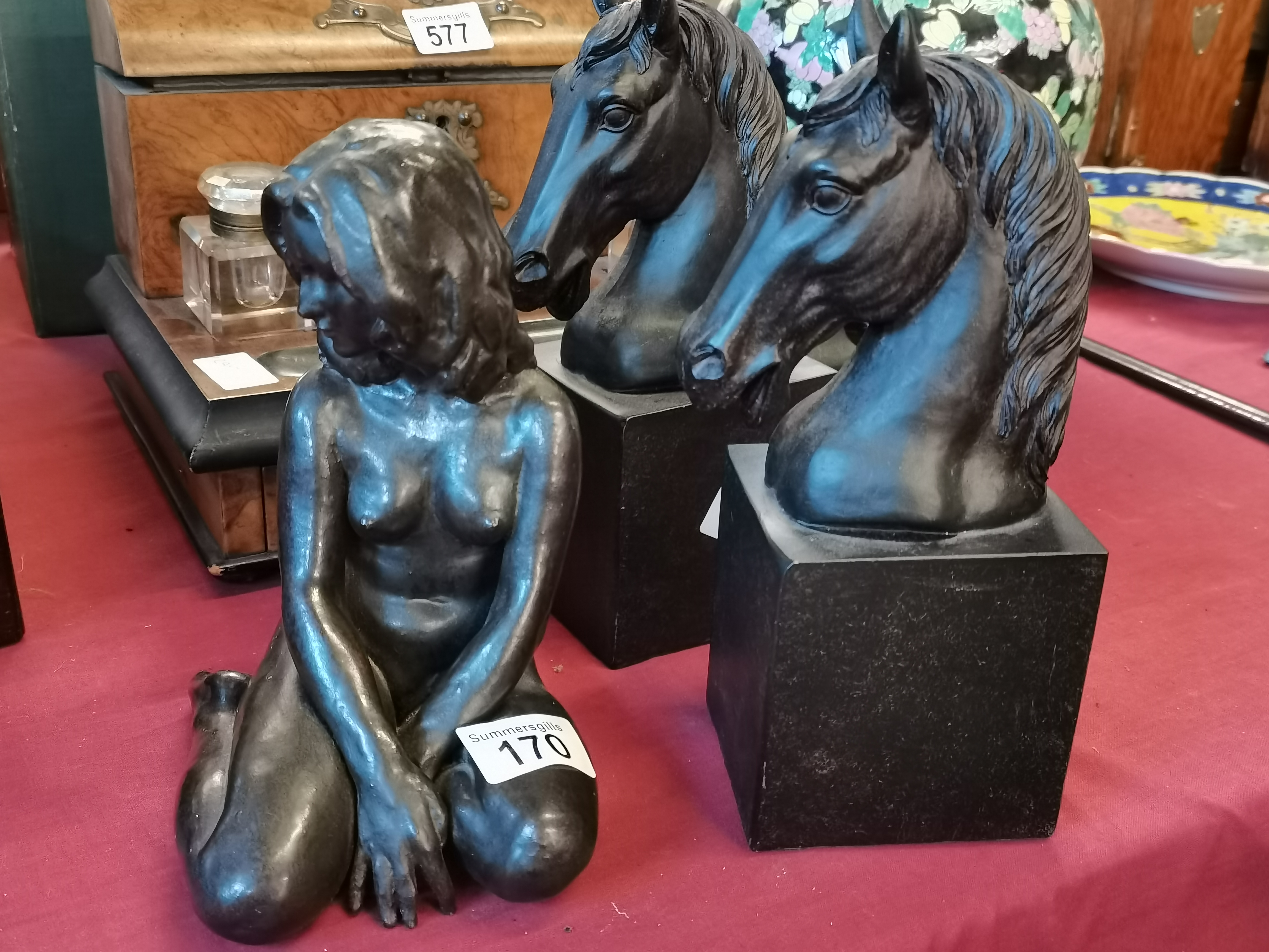 A pair of resin horse figures 25cm high plus 57/75 lady figure by w. Awlson 22cm high