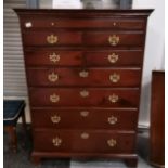 Dark oak 6 ht chest of drawers with brass handles