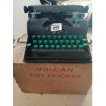 A Childs Typewriter and a Childs Vulcan Toy Cooker In Box