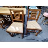 x6 Mouseman dining chairs with cream leather seats with studded detail