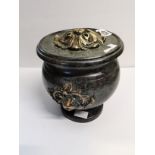 Old green marble urn