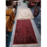 x2 rugs 97cm x 144cm (red) 138cm x 186cm (cream)