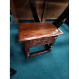 Small carved oak stool with lift up seat