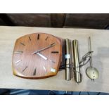 Retro wooden clock with pendulum