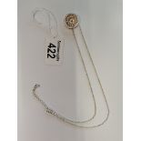 Silvered necklace with three circular diamond style inserts