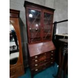 Antique mahogany bureau with glazed bookcase top