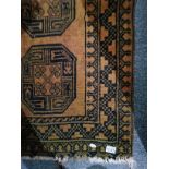 Pair of Brown pattered rugs 132cm x 72cm plus cushions
