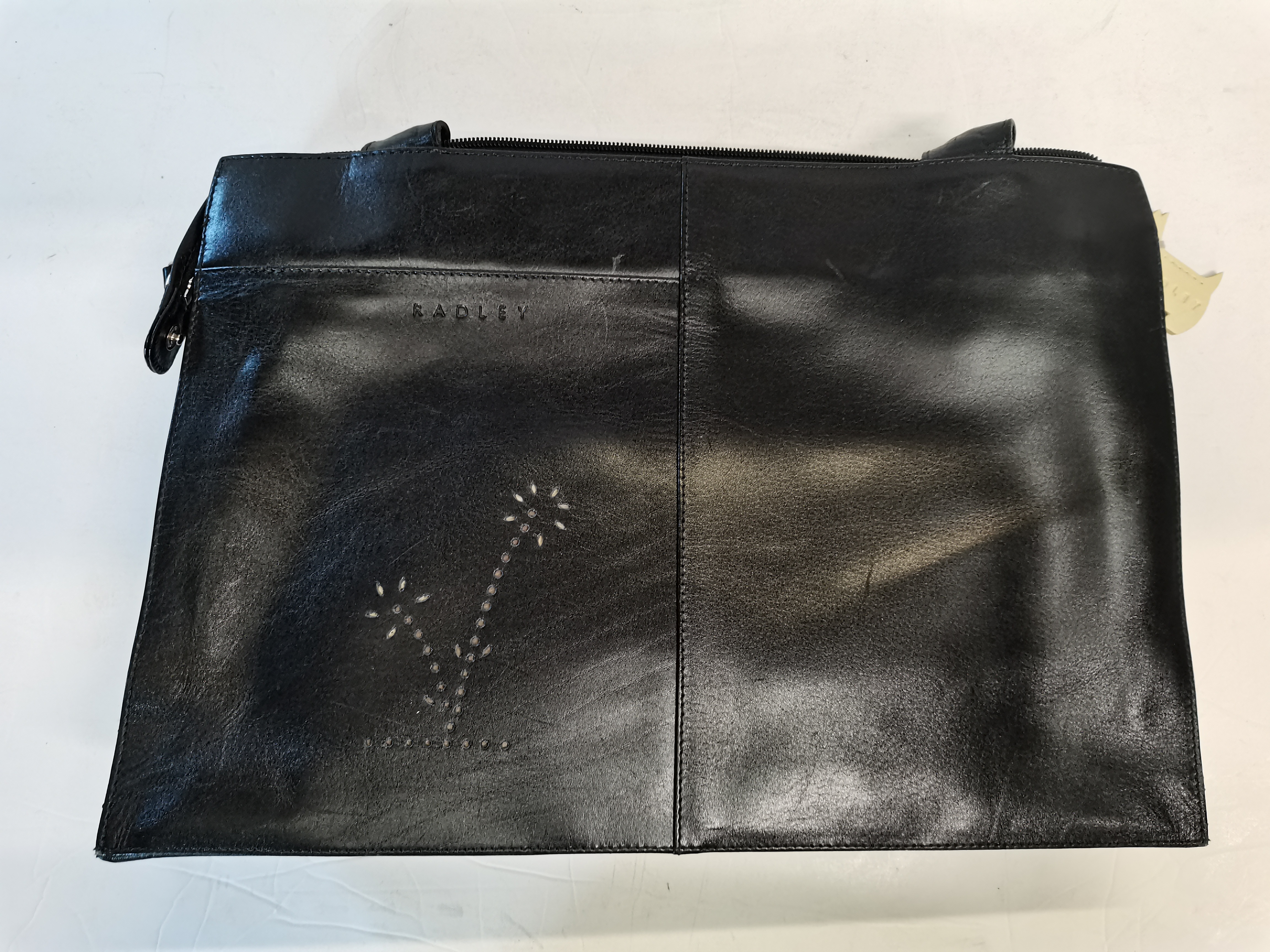 Black Radley bag with cream inside