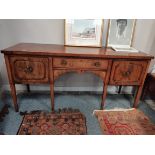 Antique sideboard with bottle storage drawer.