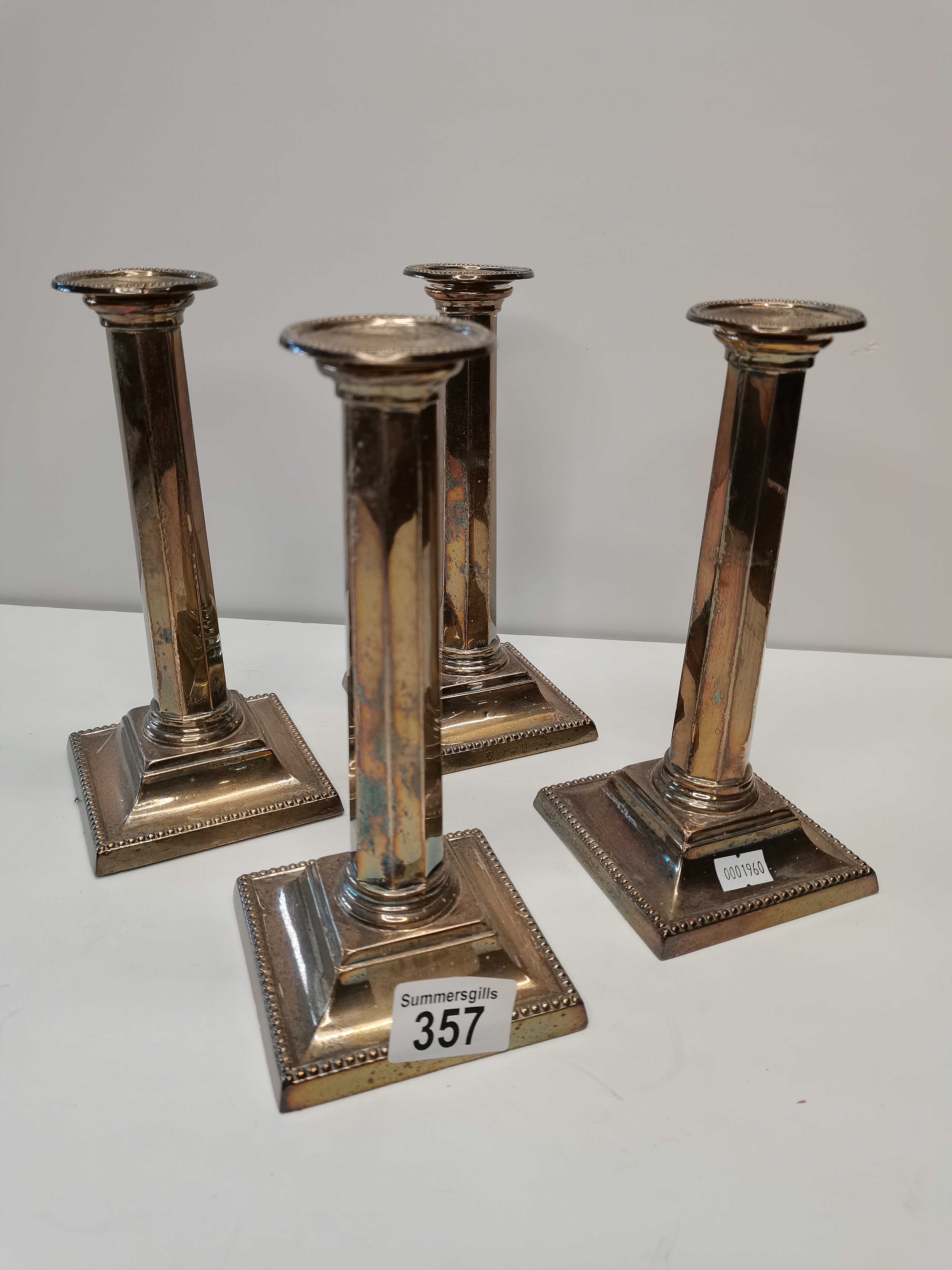 x4 Silver candlesticks in the corinthian style