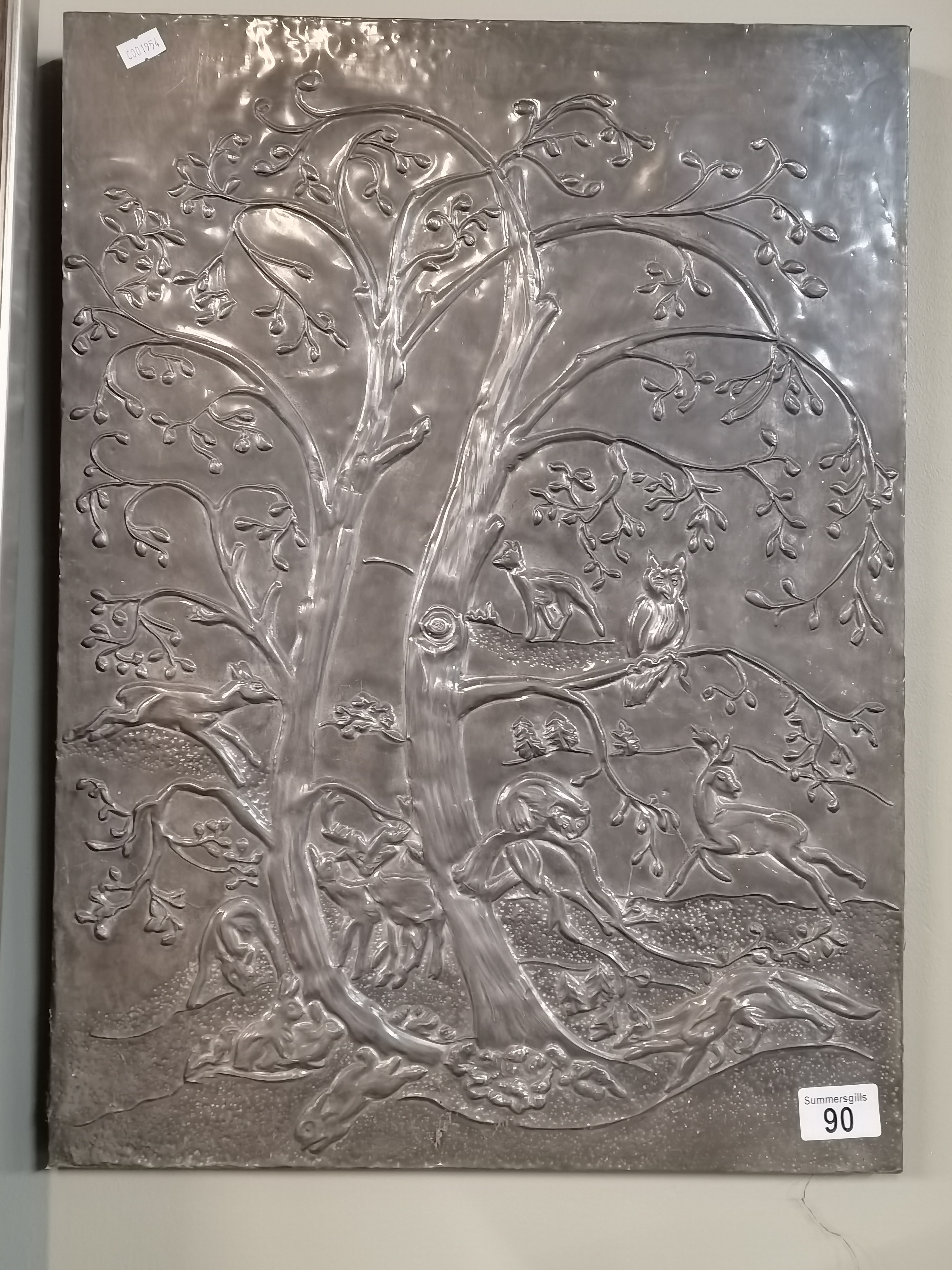 Aluminium wall plaque of woodland animals in a tree