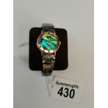 Romica watch with abalone face-strap