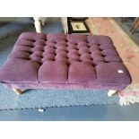 Aubergine buttoned footstool (1 leg D/D)