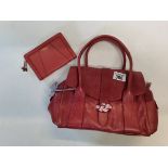 Rust coloured Radley handbag with pink stitching