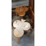 A pair of acornman milking stools in the shape of