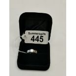 0.7ct solitaire diamond engagement ring set in platinum band with matching