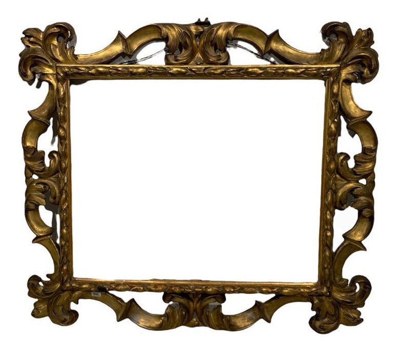 A 17TH/18TH CENTURY ITALIAN CARVED GILTWOOD FLORENTINE FRAME. (rebate 65.5cm x 80.5cm, overall 111.