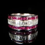 AN 18CT GOLD, RUBY AND DIAMOND HALF ETERNITY RING Having a row of baguette cut diamonds flanked by a
